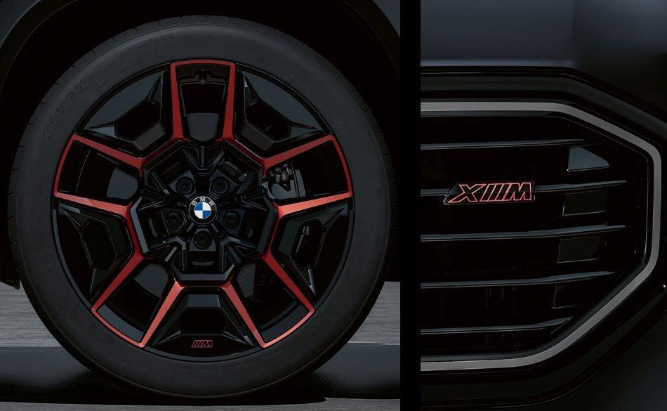 Detailed images of exclusive 22” M Wheels with red accents and XM badging on Illuminated Kidney Grille. in BMW of Bloomfield Hills | Bloomfield Hills MI